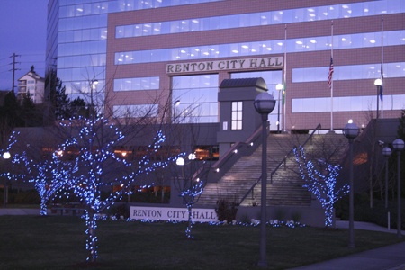 The trees in front of Renton City Hall will be lit in blue through Jan. 1 to honor the four Lakewood police officers who were shot to death. It's the city's first observance of the nationwide Project Blue Light.