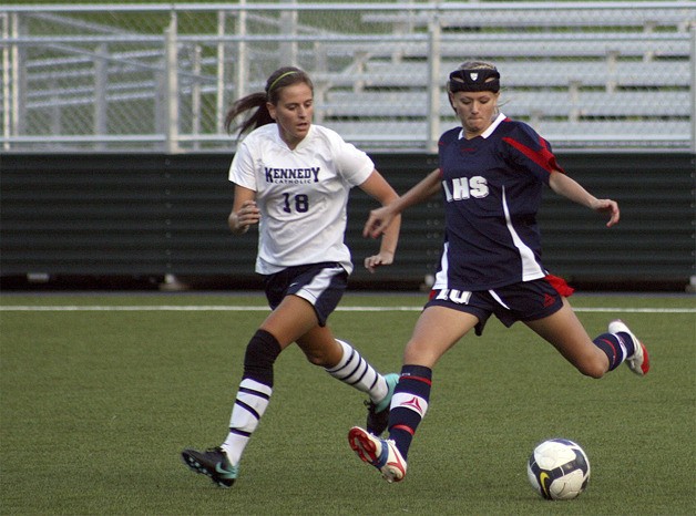 Whitney Hilde brings the ball up the field against Kennedy Catholic Tuesday.