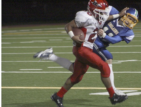 Renton's Mar'que Fluker stiff arms a Hazen defender. But Hazen got the last laugh