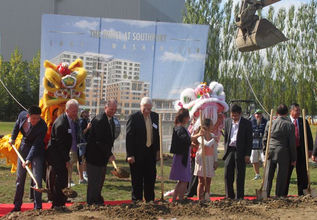 Officials break ground Wednesday on the new 12-story Hotel at Southport on lake Washington.