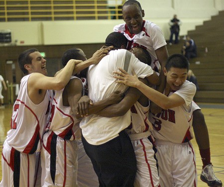 Renton High players Achoki Moikobu