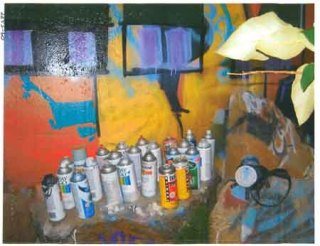 Renton police recovered cans of paint and a respirator from under a bridge on SR 169 and arrested two men.