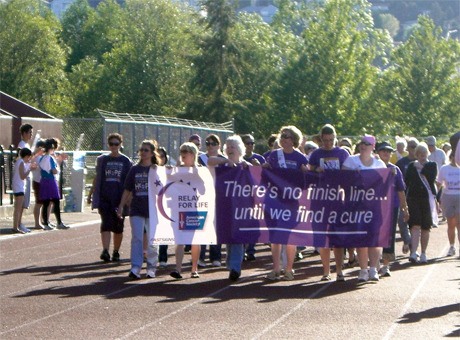 The Renton Relay for Life kicks off with a survivor's lap in May 2009.