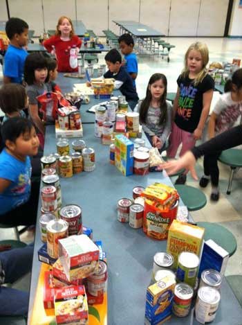 Maplewood first-graders used their math skills to count donated food items.