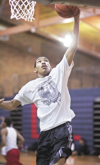 Lindbergh’s Dalles Searles makes a lay-up in a practice drill.