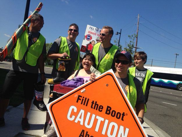 Renton firefighters collect money for the Muscular Dystrophy Association.