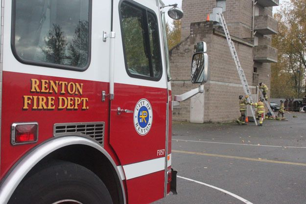 Recruits train at the Renton Fire Department headquarters station earlier this year.