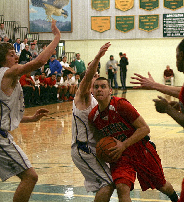 Renton's Colton Hafey drives against Sumner Feb. 21.