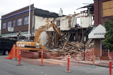 Crews used heavy equipment to tear down the historic building on Wells Avenue South.