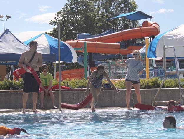 Lifeguards train Tuesday at the Henry Moses Aquatic Center. The center opens Saturday.