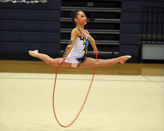 Renton's Ashley Cheuk performs at a rhythmic gymnastics meet.