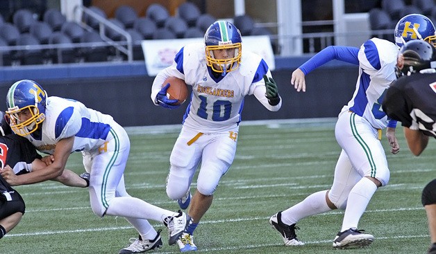 Hazen's Cody Taylor finds a gap to for another first down Saturday