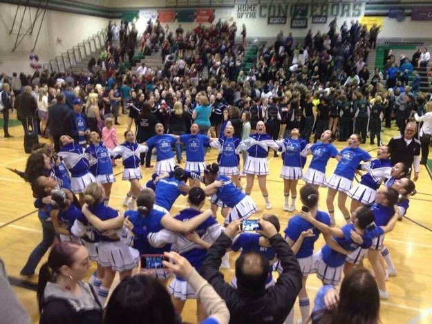 The Hazen Drill Team celebrates its West Central District Dance and Drill victory this past weekend at Kentwood High School.