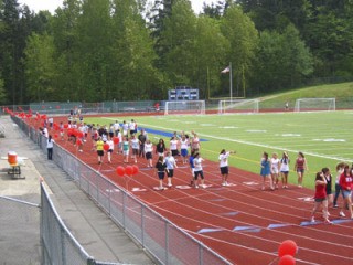 Liberty students walk in the first annual walk-a-thon held by Liberty High School’s Honors Society last year. That walk-a-thon brought in $3