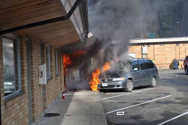 Flames jumped from an apartment to a vehicle out front during a fire Sunday at the Rivera Apartments.