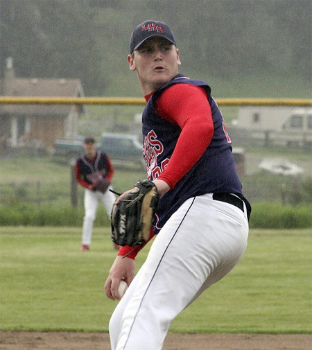 Lindbergh's Matt Stuart pitches through a rain shower in the regional round of the 2A state tournament May 21.