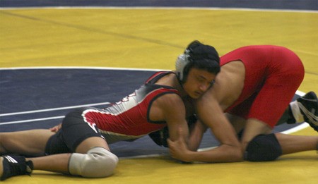 Renton's Saugat Chhetri wrestles against Lindbergh earlier this season.