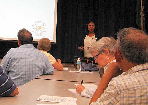 City of Renton Senior Planner Rocale Timmons fields questions about a new development in Tiffany Park.