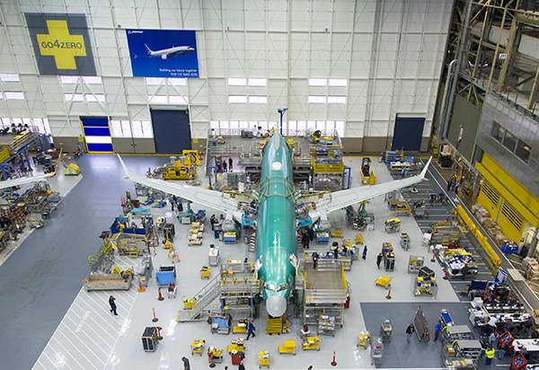 Boeing mechanics in Renton have attached the wings to the first 737 MAX 8