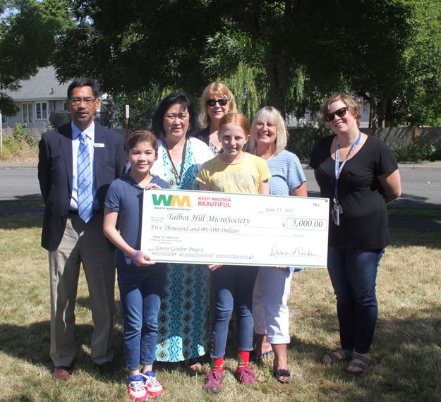 Waste Management awarded the Talbot Hill Micro Society program a $5