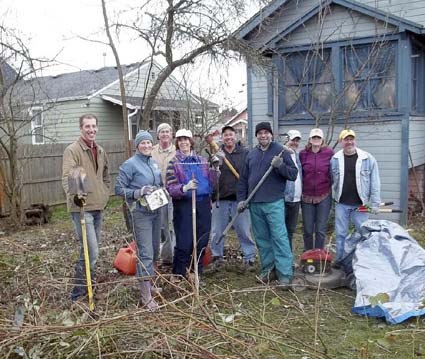 Volunteers who pitched in to help a neighbor in North Renton as part of the Clean Community Initiative are