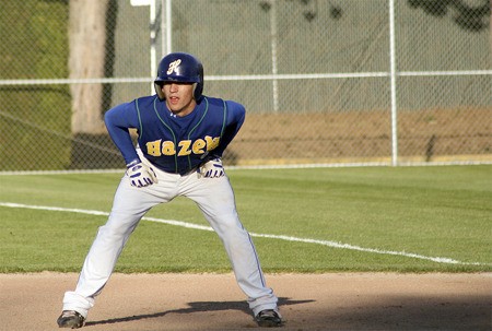 Hazen senior John Wall leads off first base May 7 in a Seamount/SPSL sub-district game. Wall batted .456 this season and was named first team all-league at second base.