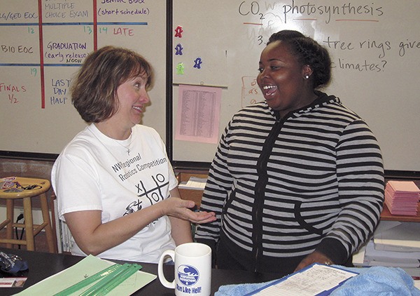 Lindbergh senior Kendra Duncan chats with teacher Kari Hollandsworth about being able to walk with the Class of 2013.