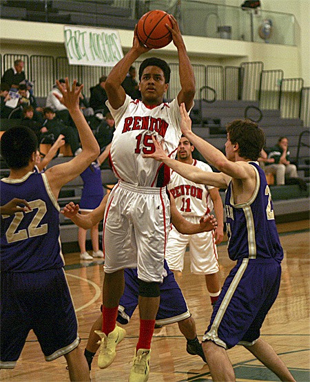 Renton's Darren Briggs puts up a shot against Sequim Feb. 16.