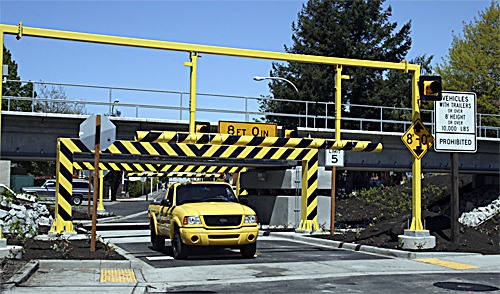 The Shattuck Avenue bridge near Fourth Place South reopened to traffic Friday after being closed since mid-2007. The new 8-foot-tall bridge with protective 'sacrifice' beams on either side replaces a bridge - known as the cow bridge - only 6 feet 6 inches tall and wide enough for just one lane.