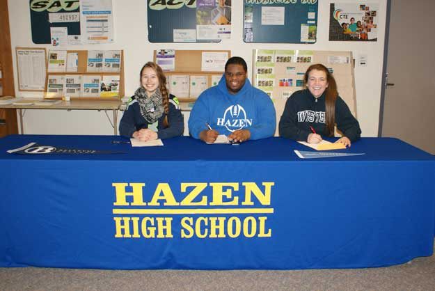 Hazen athletes sign their college letters of intent.