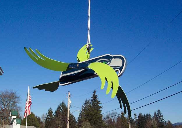 Dick and Donna Sherman of Renton are hoping their homemade weather vane points the way to the promised land for the Seahawks.