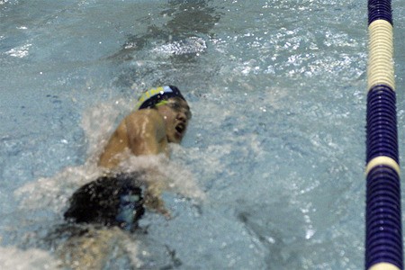 Hazen’s Corbin Kozai swims at the Seamount League swim & dive meet Feb. 5. Hazen took third at the meet and the vast majority of Highlanders made personal bests.