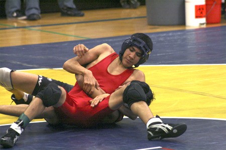 Lindbergh’s Luke Garcia wrestles against Renton at a double dual match Dec. 17 at Hazen High School.