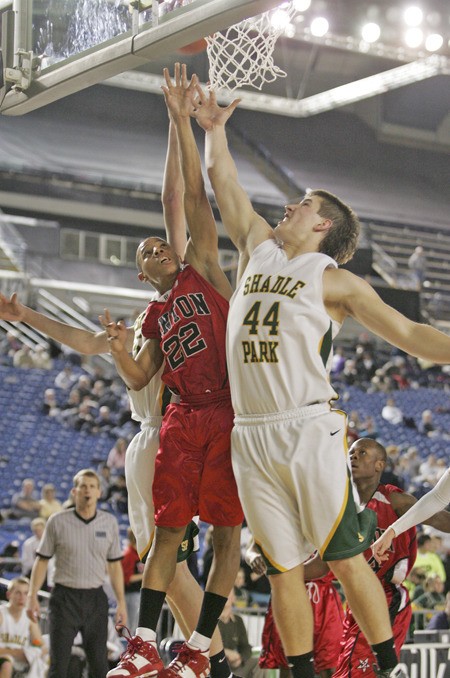 Joseph Powell goes up for a rebound during Renton's first round game against Shadle Park.