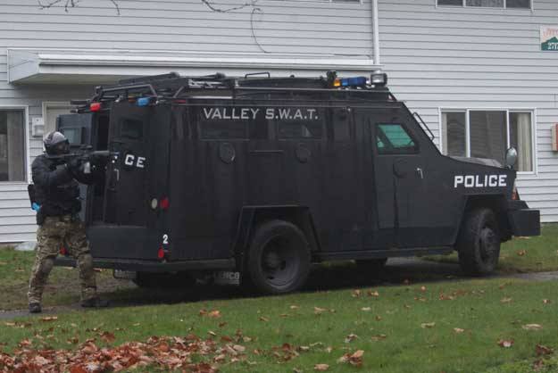 Members of the Valley SWAT team practice Thursday at Sunset Terrace in Renton.