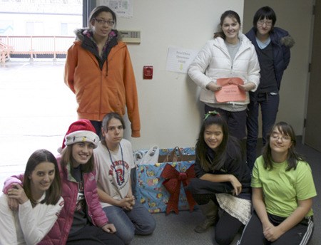 New Girl Scouts troop at New Horizon School collects food