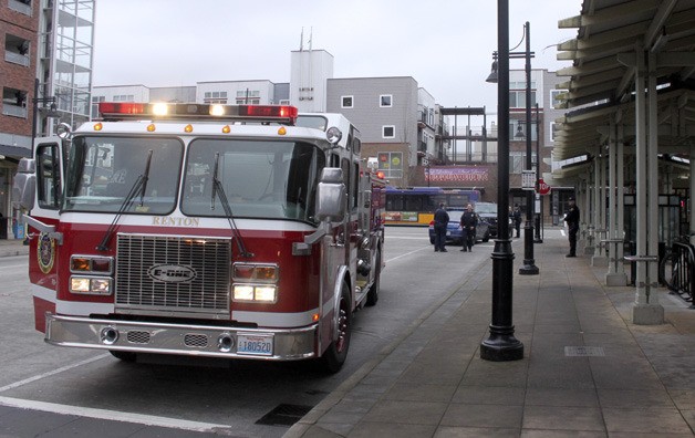 Renton fire crews and police officers responded to a fight early Thursday afternoon at the Renton Transit Center downtown that left a man unconscious