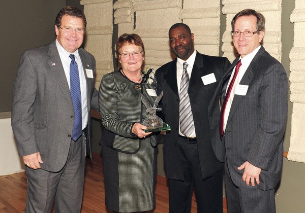 Four outstanding volunteers were recognized Thursday night at the Renton Citizens of the Year banquet. Jay Covington