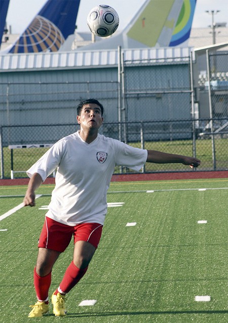 Renton's Michel Arias lines up a kick Apri 21 against Hazen.