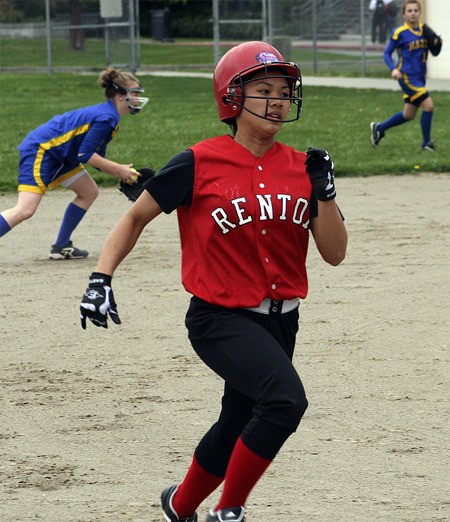 Renton's Wanda Saechin rounds second and heads towards third April 19 against Hazen.