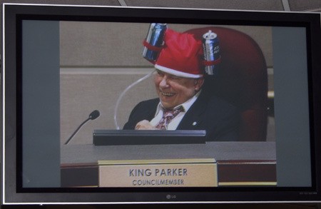 King Parker made it clear Monday night one thing he plans to do now that he has retired from the Renton City Council. He got a big laugh when he put on this festive hat anchored by two cans of Bud Light Beer.