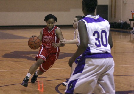 Renton guard Taylor Williams drives into the key against the Highline defense.