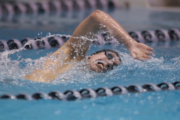 Liberty's Logan Briggs swimming in the 500-yard freestyle at the 3A state swim and dive championships Feb. 19.