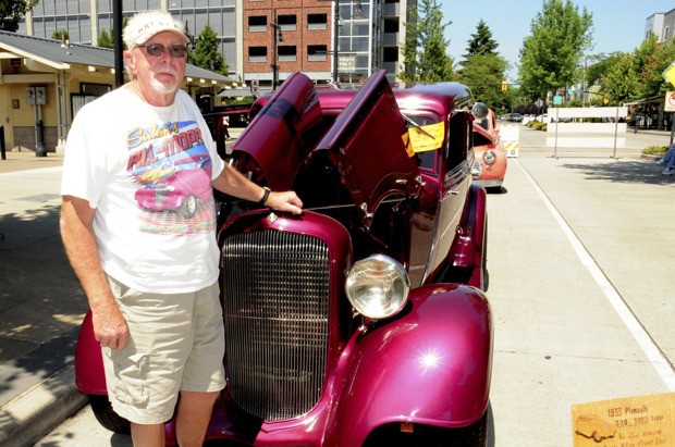 Ron Carroll displays his 1933 Plymouth at Sunday's Return to Renton Benefit Car Show at the Piazza. The Plymouth has been a family project and won Best in Show at show in Salem