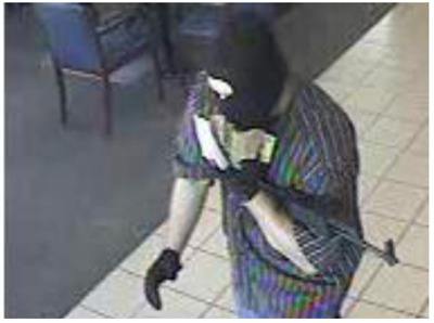 This robber used an assault rifle to rob a North Bend bank on July 6.