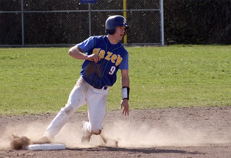 Hazen second baseman John Wall slides into second against Renton.