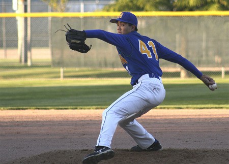 Hazen pitcher Jimmy Schimdt tosses an early-inning pitch against Auburn Mountainview May 7. The Highlanders allowed just four hits