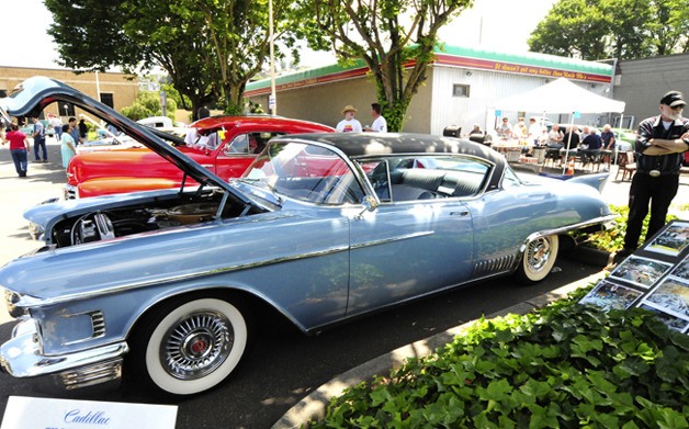 Michael Thompson stands guard over his rare 1958 Cadillac Eldorado Seville at the Return to Renton Car Show July 11.