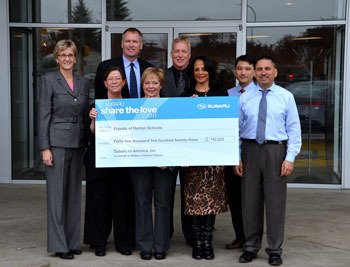 Walker’s Renton Subaru presented a check for nearly $43