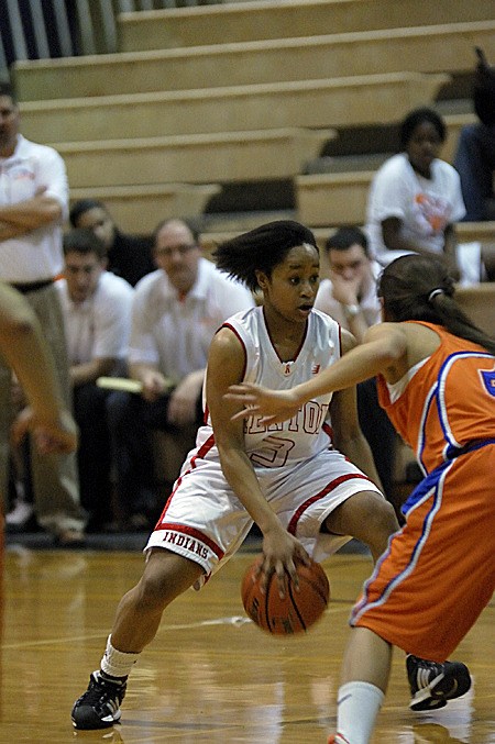 Taylor Williams tries to drive around an Auburn Mountainview defender in the Feb. 18 sub-district game.